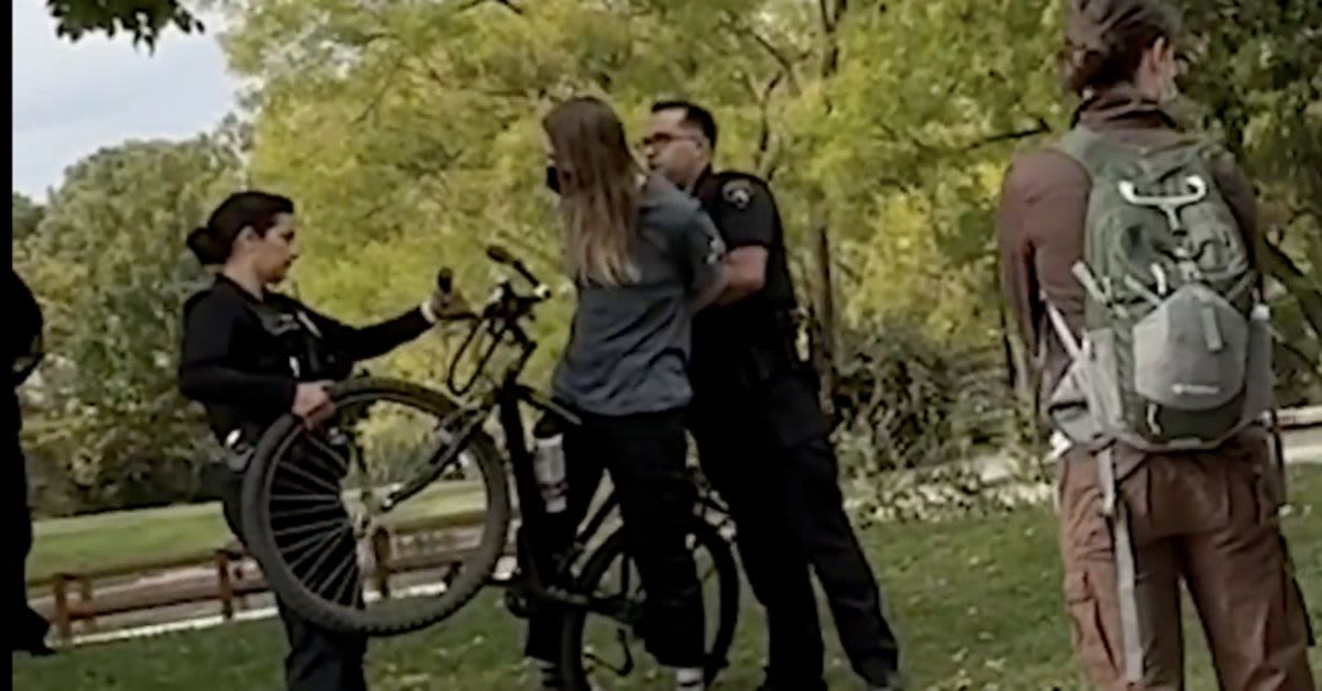 Video Captures UNM Turmoil: Masked Man Steals Signs, Declares Kirk Got Shot In The Neck For A Reason